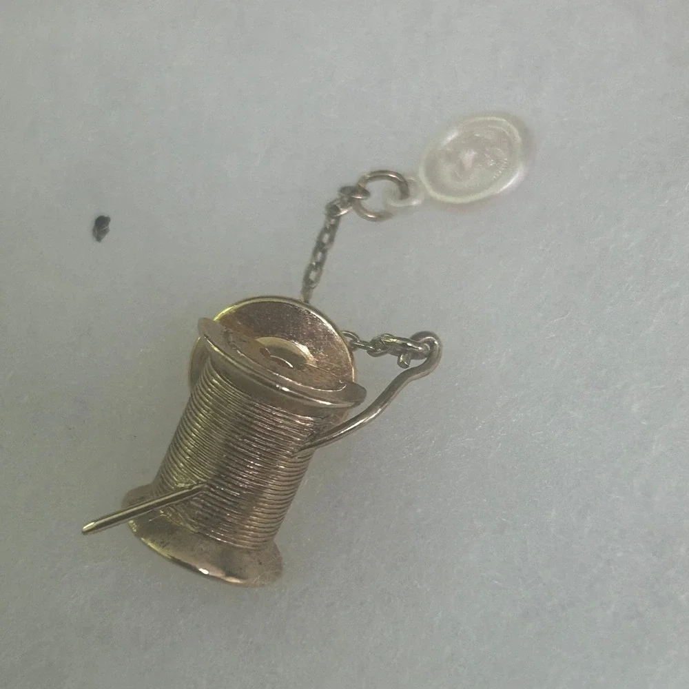Avon Gold Tone Spool of Thread Needle and Button Sewing Lapel Pin Vintage #756